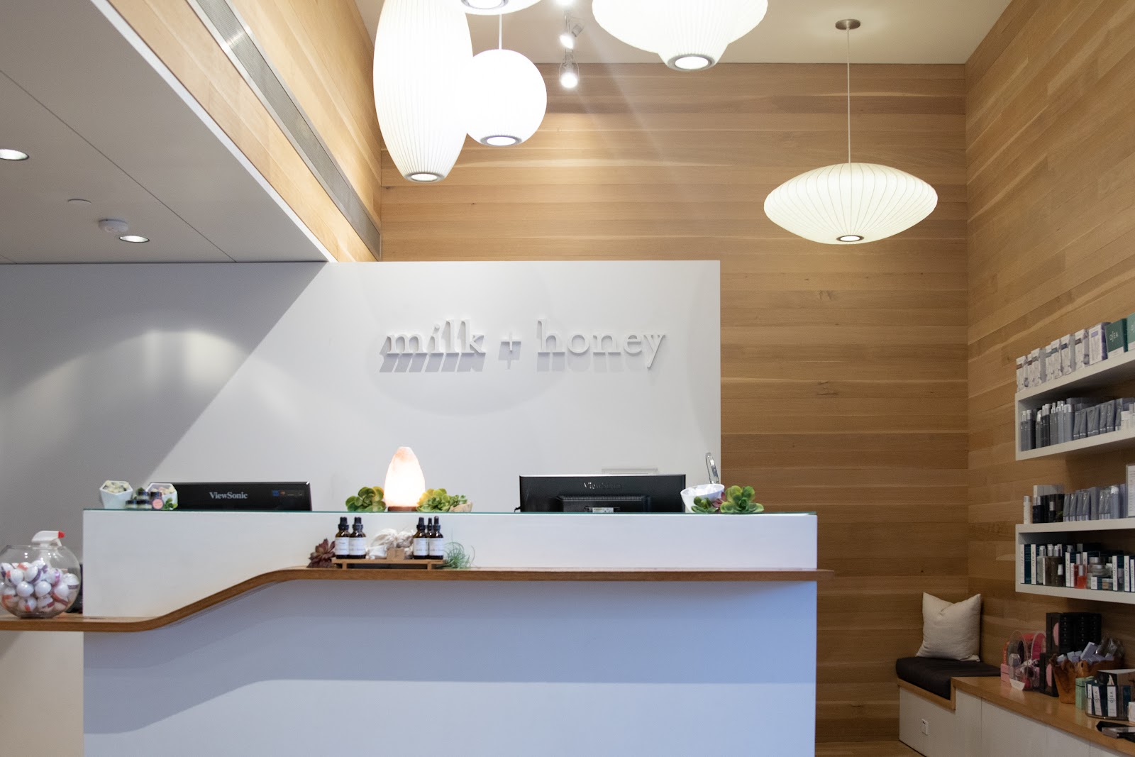 milk + honey | Downtown Austin logo